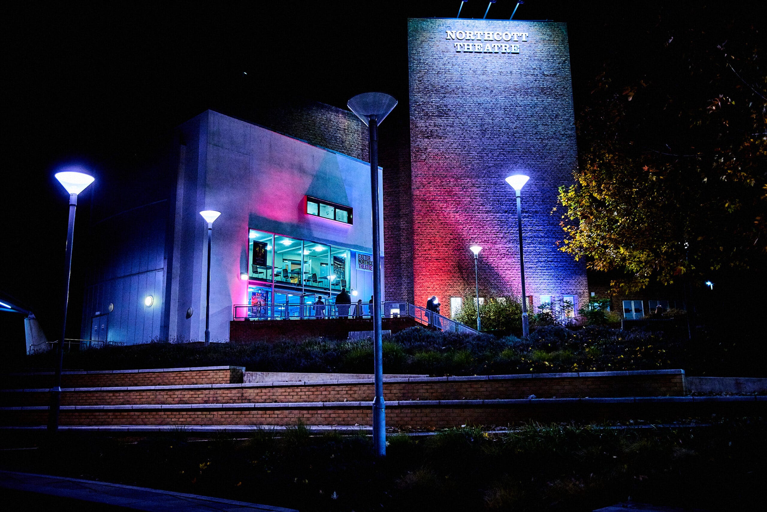 Photo of Northcott Theatre building at night
