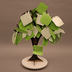 The Memory Tree - Green and white note cards on a cut-out tree frame