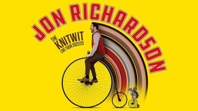 Jon Richardson riding a penny-farthing bicycle followed by a squirrel riding a squirrel-sized penny-farthing bicycle