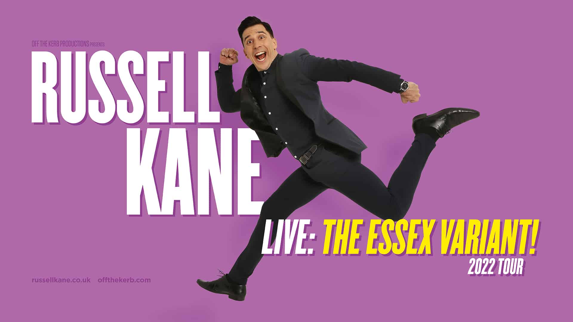 Russell Kane promotional image. Comedian Russell Kane is running comically through the frame, wearing a black suit. The background is purple. Text reads: 'Russell Kane Live: The Essex Variant UK 2022.'