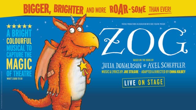 Zog artwork. In the middle of the image, Zog, an orange dragon with a plaster on their right arm and a gold star pinned to their chest. Text to the left of Zog reads: ‘Five stars. A bright colourful musical to capture the magic of theatre. What’s Good to Do’. Text above Zog reads: ‘Bigger, brighter and more roar-some than ever!’. Text to the right of Zog reads: ‘Freckle productions in association with Rose Theatre present. Zog. Based on the book by Julia Donaldson & Axel Scheffler. Music & lyrics by Joe Stilgoe’. Adapted & Directed by Emma Kilbey. Background: a blue/navy gradient with light blue stars.