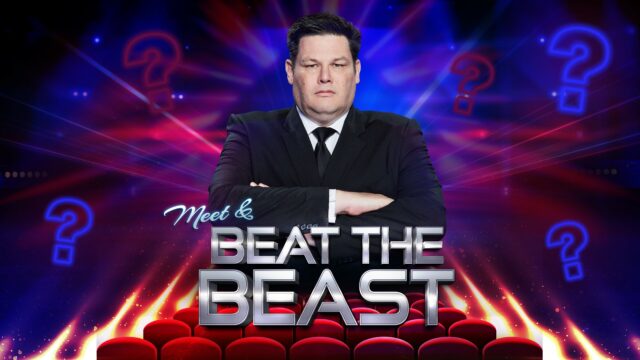 Meet & Beat the Beast. ‘The Beast’ Mark Labbett is wearing a black suit, white shirt and black tie. He's standing in the middle of the image, arms crossed, staring down the onlooker. The background is reminiscent of The Chase TV show.