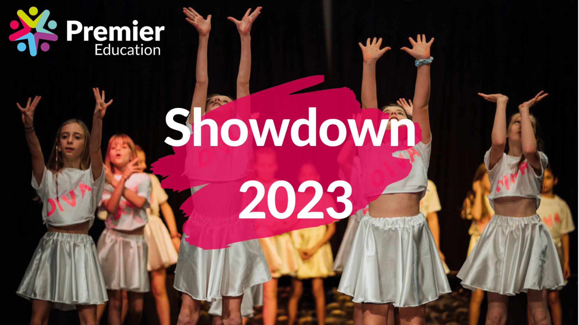 A group of children dancing on stage. Premier Education logo. Text reads: Showdown 2023