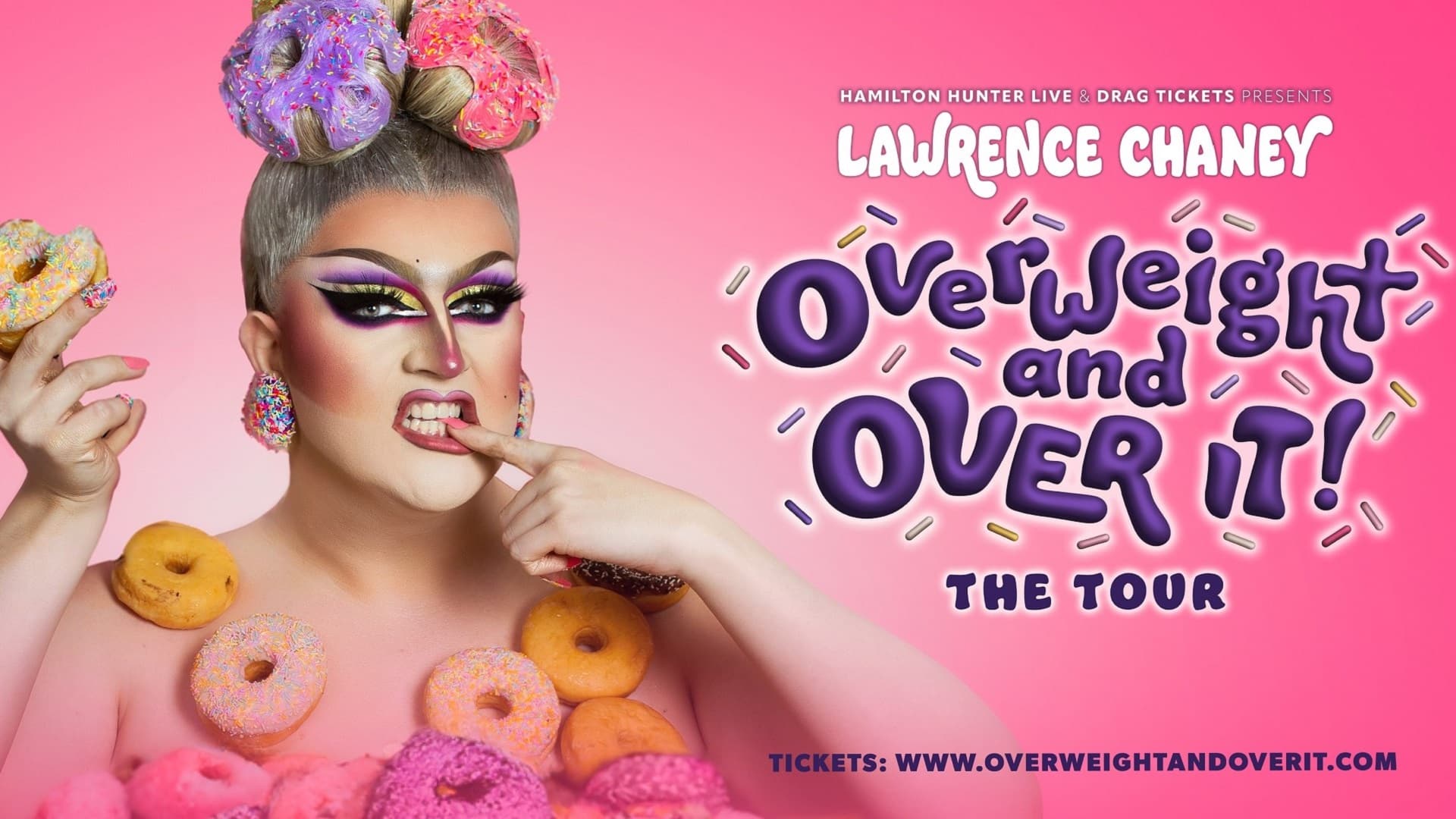 Lawrence Chaney dressed in drag. They wear colourful makeup, false nails and earrings that look like they're covered in icing sprinkles, space buns decorated to look like doughnuts and dress made our of doughnuts. The background is pink. In purple bubble style writing are the words: Hamilton Hunter Live and Drag Tickets present - Lawrence Chaney - Overweight and OVER IT! The Tour.