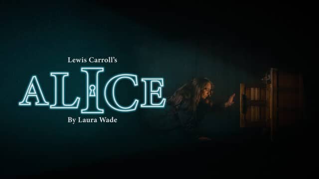 Alice promotional artwork: murky grey background; a young person with long brown hair kneels beside a glowing, half-open doll's house and reaches towards it; text reads 'Lewis Carroll's Alice by Laura Wade'; 'Alice' is written in sky blue neon with a keyhole inside the 'I'.