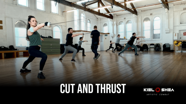 Background: a photo of seven people in sportswear lunging forwards with cutlasses in their outstretched hands. They are in a wooden-floored rehearsal room with daylight streaming through windows. Overlaid white text reads: 'Cut and Thrust'; Kiel O'Shea Artistic Combat'.