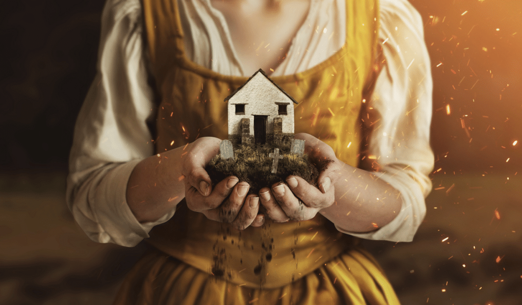 The Commotion Time artwork: A young woman wearing historical clothing (white shirt under a yellow dress) is seen from neck to waist. In her outstretched hands she holds a miniature Gildhouse, set atop a mound of grassy earth. The earth falls through her fingers.