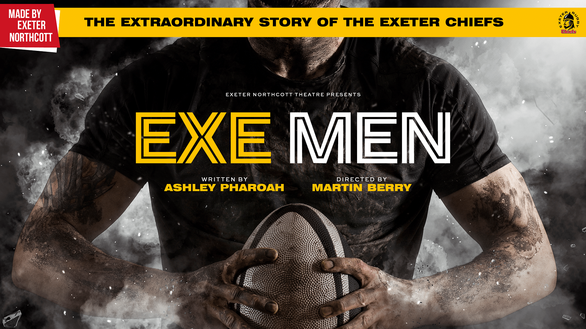 Exe Men promotional artwork: A torso and arms of a male rugby player with dirt streaked arms, wearing a black shirt and holding a rugby ball. Atmospheric smoke surround him. Bold white and yellow text reads: