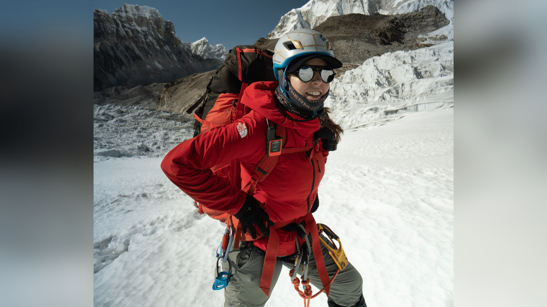A photograph of Adriana Brownlee climbing a snowy mountain.