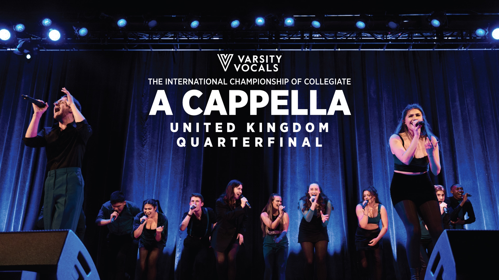 A photograph of an a cappella team performing on stage. Text reads: 'Varsity Vocals. The International Championship of Collegiate. A Cappella. United Kingdom Quarter Final'.