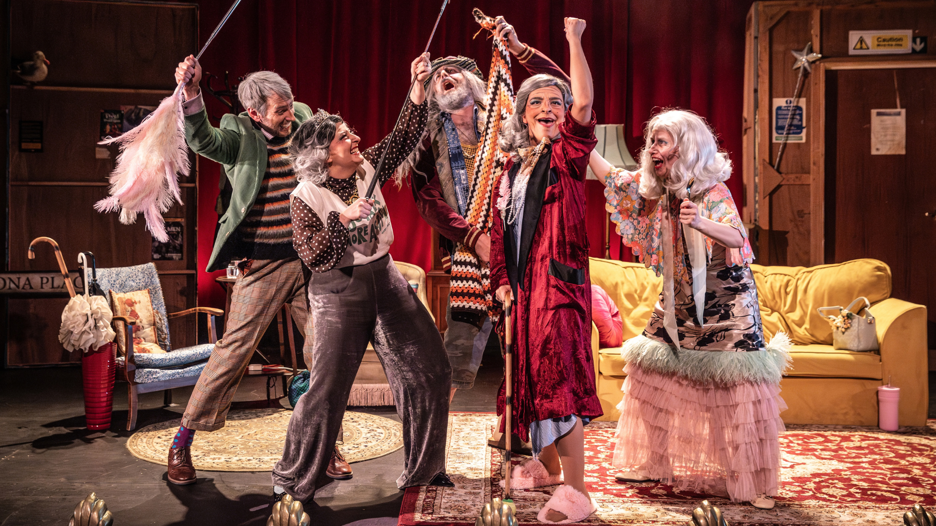 The cast of Forever Young playing older versions of themselves. They're playing a make-shift band, where a feather duster, a walking stick and spoons serve as instruments, having a great time.