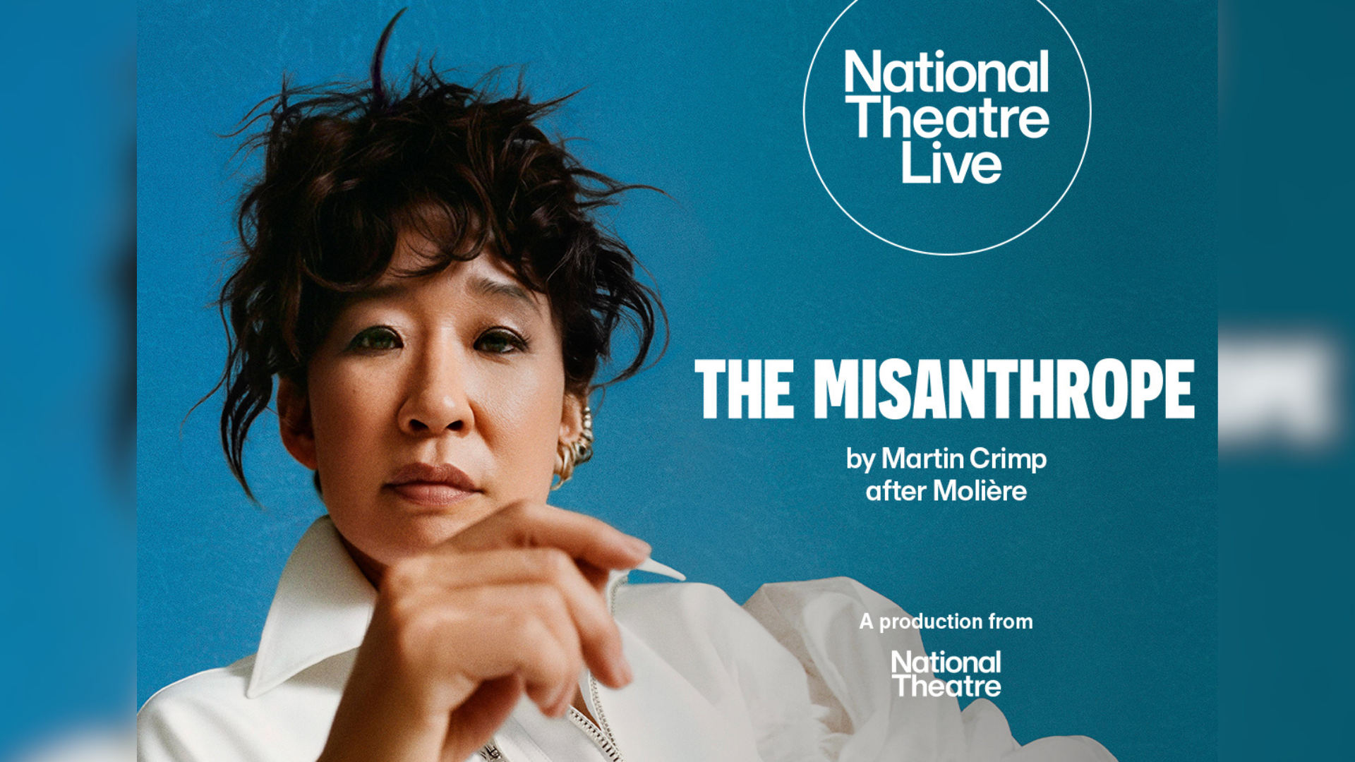 The Misanthrope promotional artwork: a photograph of Sandra Oh staring directly at the camera against a blue background. She has her hair up and is wearing a white jacket. Text reads: 'National Theatre Live. The Misanthrope. By Martin Crimp after Moliere. A production from the National Theatre'.
