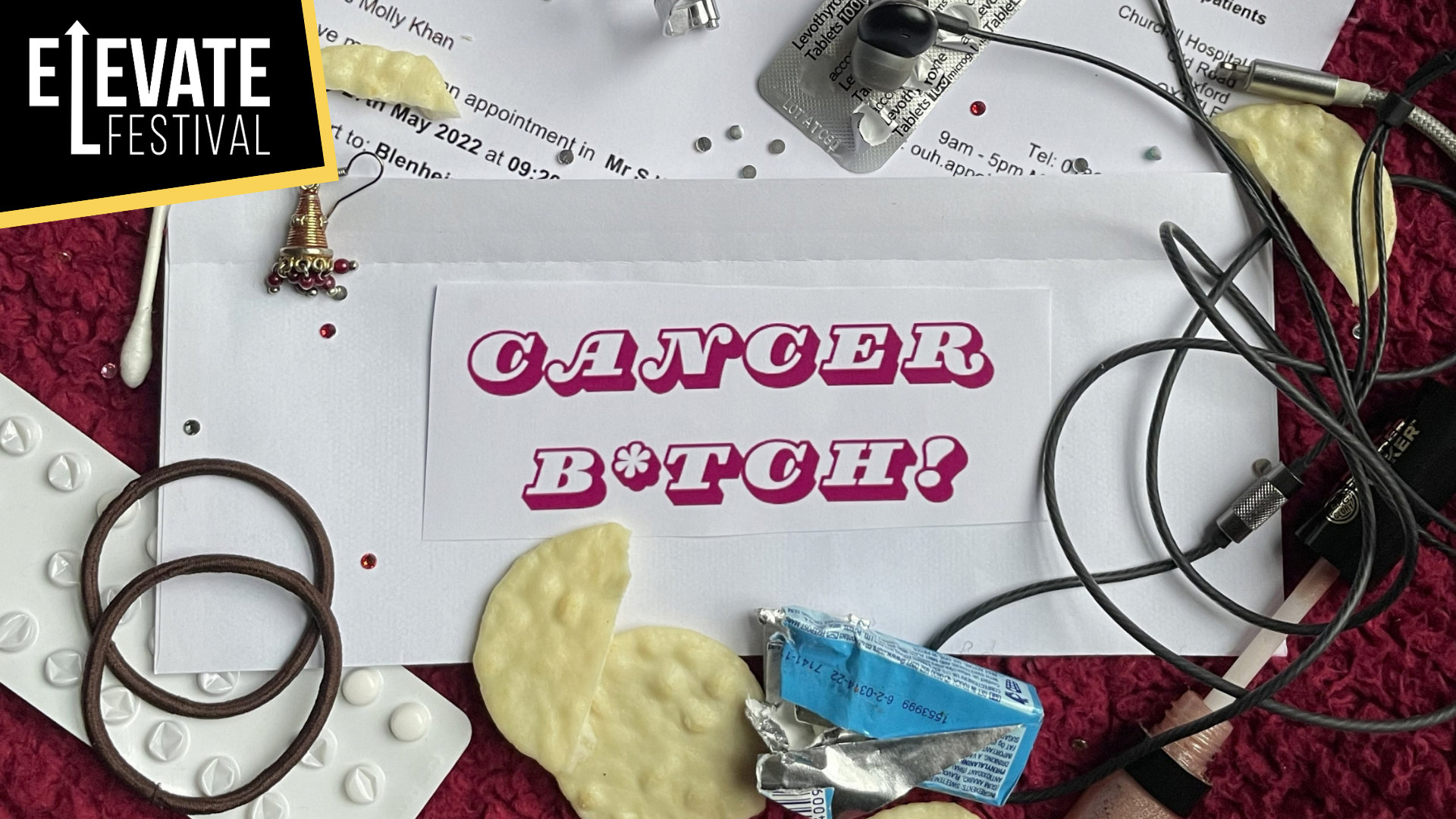 Cancer Btch Artwork: Photos NHS letters, hairbands, half eaten biscuits and tablets are lying on a table. Text reads: Cancer B*tch!